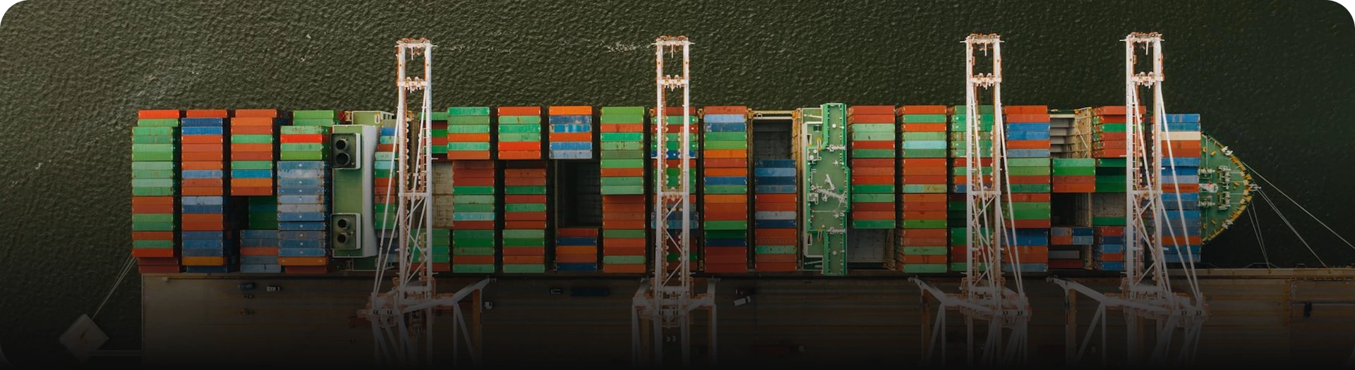 Carrier ship on top view carrying a lot of containers